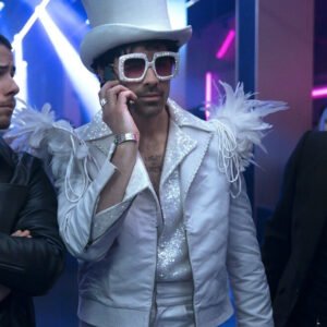 A Very Jonas Christmas Movie 2025 Joe Jonas White Jacket